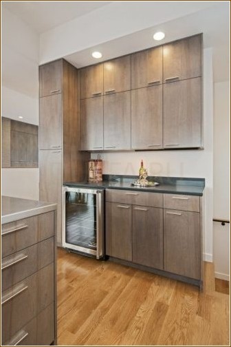Нужны ли на кухне шкафы до потолка?